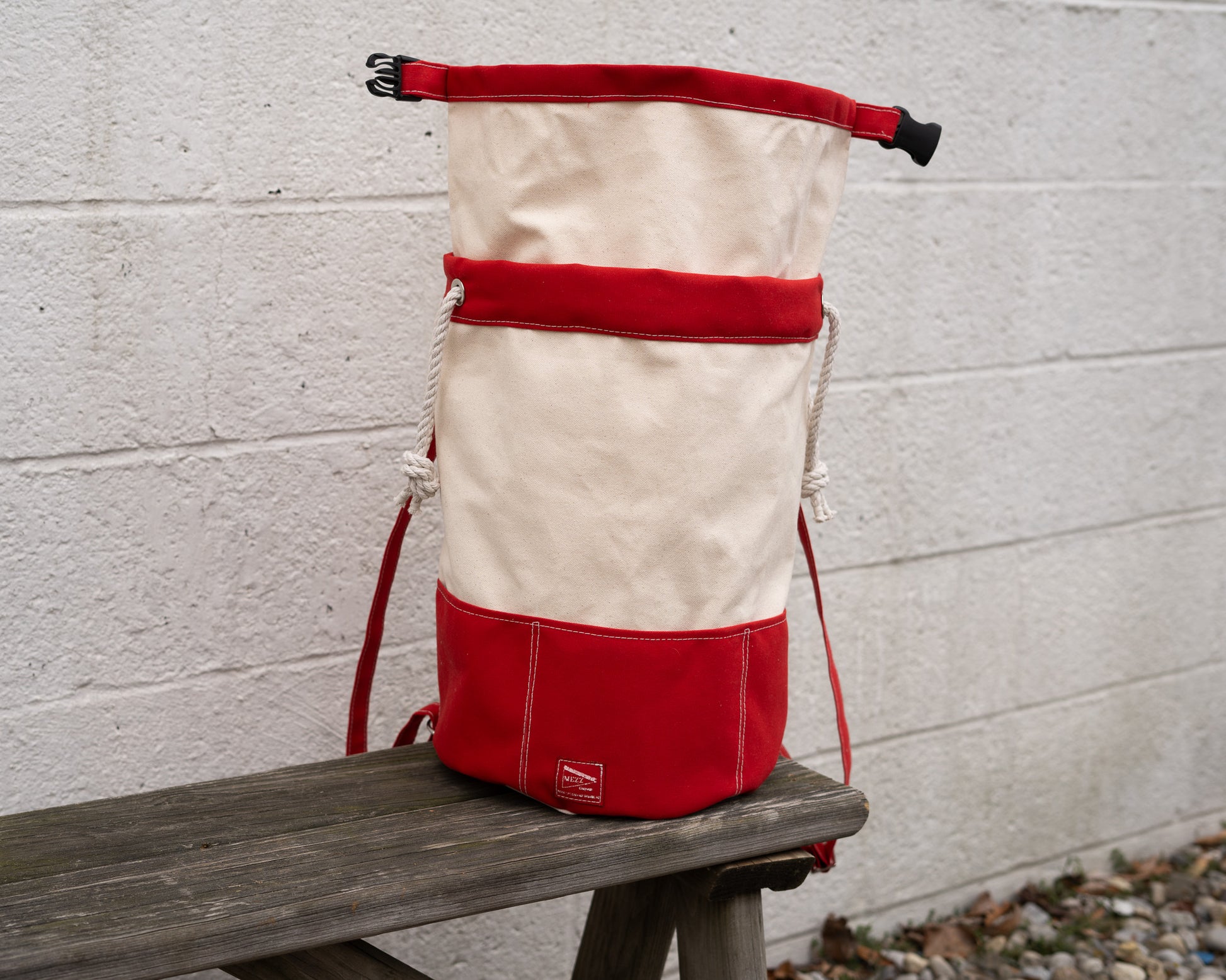 red Canvas Rolltop Backpack closure