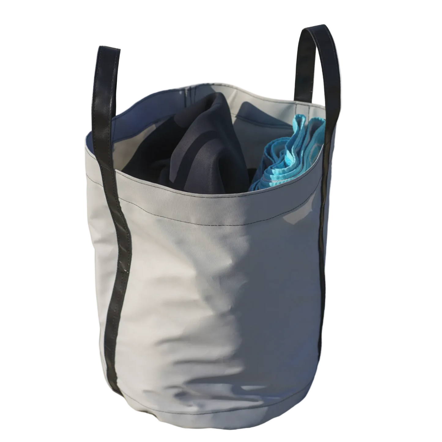 Mezz Waterman Wetsuit bag carrying a surfer's wetsuit and towel